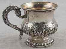 Appraisal: A Georgian silver child's footed mug with embossed fern and