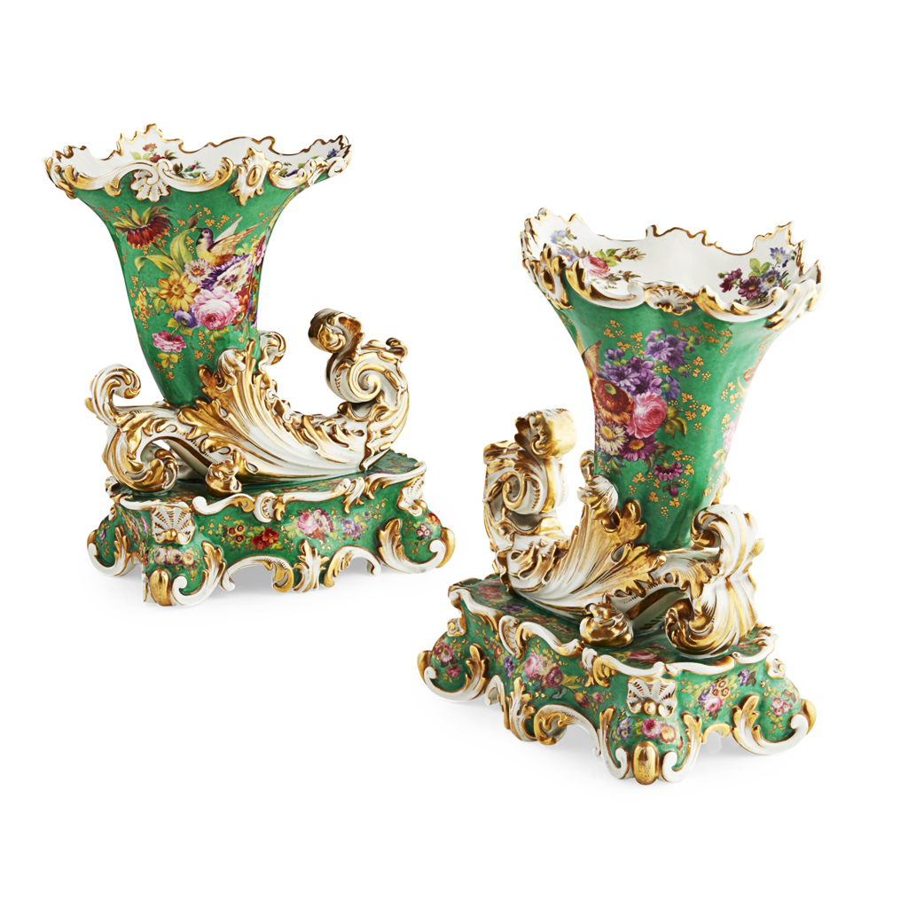 Appraisal: PAIR OF JACOB PETIT PORCELAIN CORNUCOPIA VASES TH CENTURY ornately