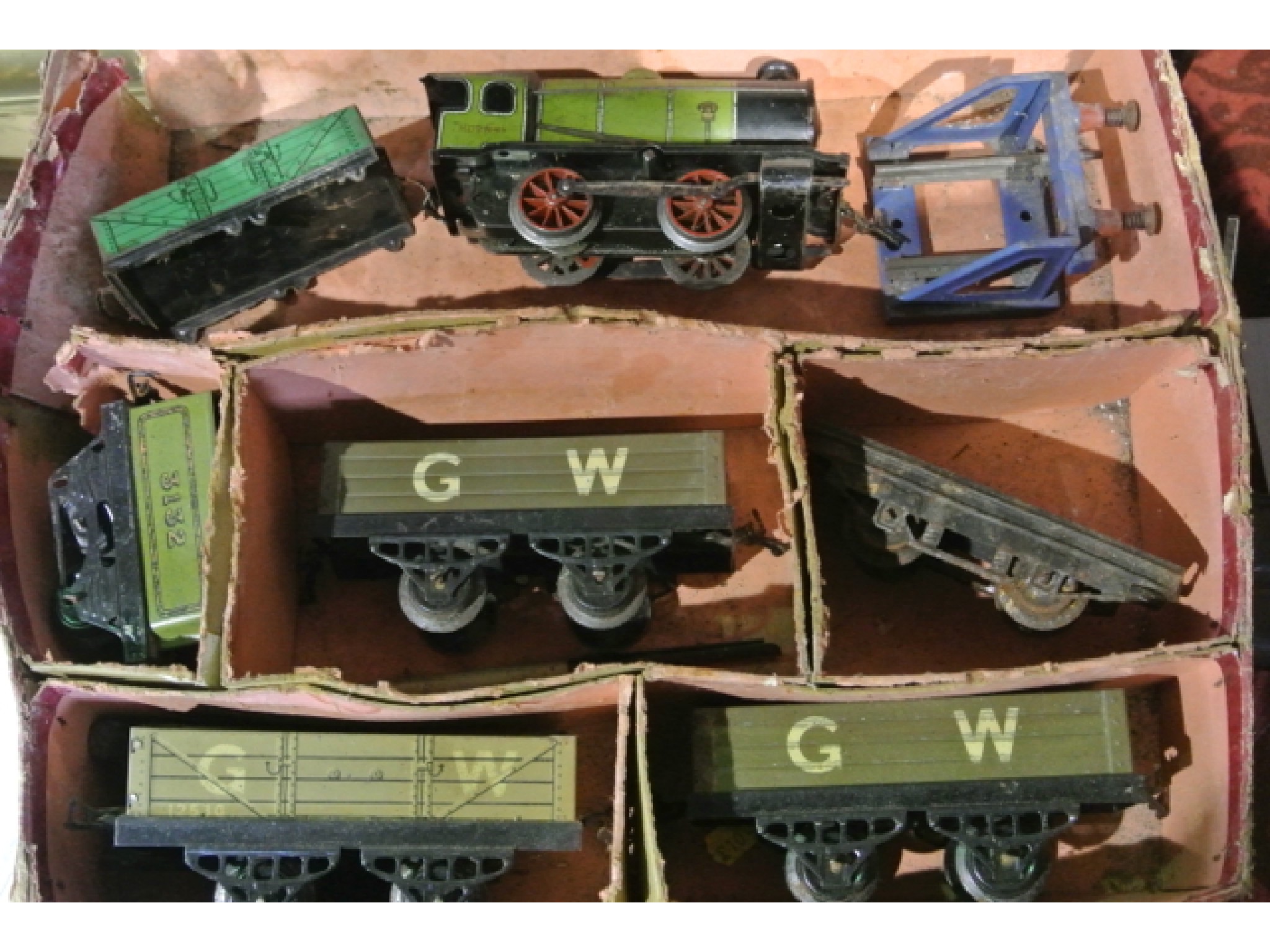 Appraisal: A Hornby Gauge engine with rolling stock marked G together