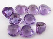 Appraisal: A quantity of loose polished heart shaped amethysts approx carats