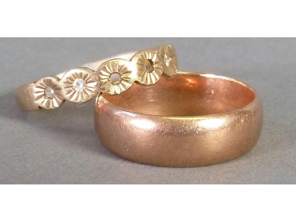 Appraisal: CT GOLD BROAD WEDDING RING and a CT GOLD RING