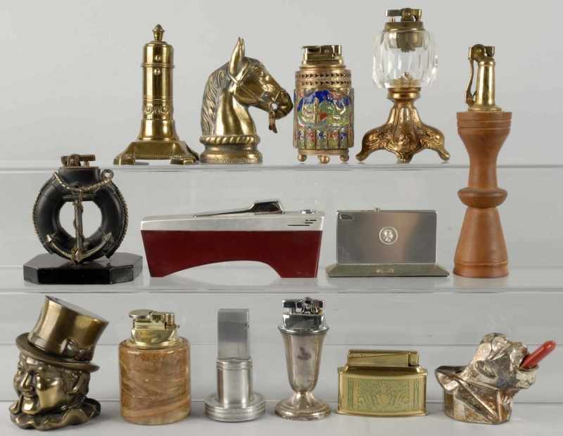 Appraisal: Lot of Approximately Figural Lighters Condition Good Size Largest T