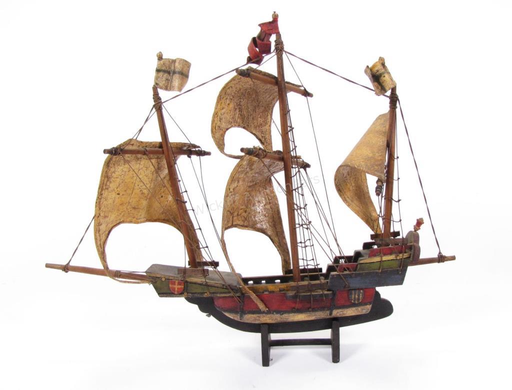 Appraisal: Wooden Model Ship three masts with hide sails red blue