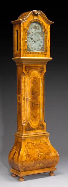 Appraisal: A German Baroque style inlaid walnut tall case clock mid