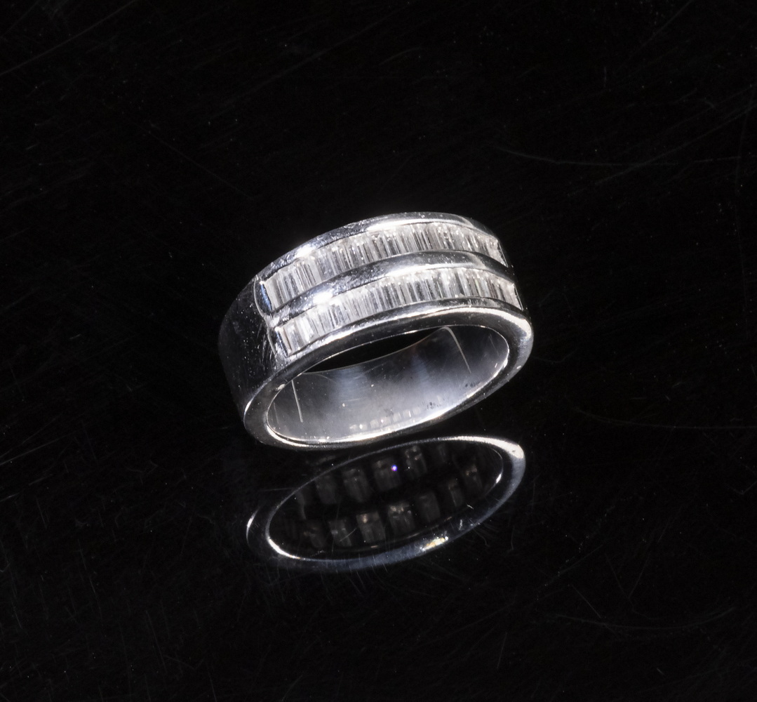 Appraisal: PLATINUM AND DIAMOND BAQUETTE DOUBLE ROW BAND RING Custom made