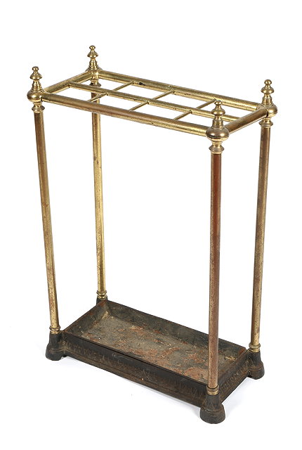 Appraisal: A VICTORIAN BRASS STICK STAND with eight divisions cast iron