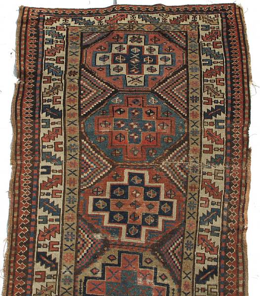 Appraisal: A Caucasian rug size approximately ft in x ft in