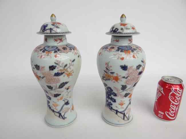 Appraisal: Pair Asian porcelain vases with lids '' Ht