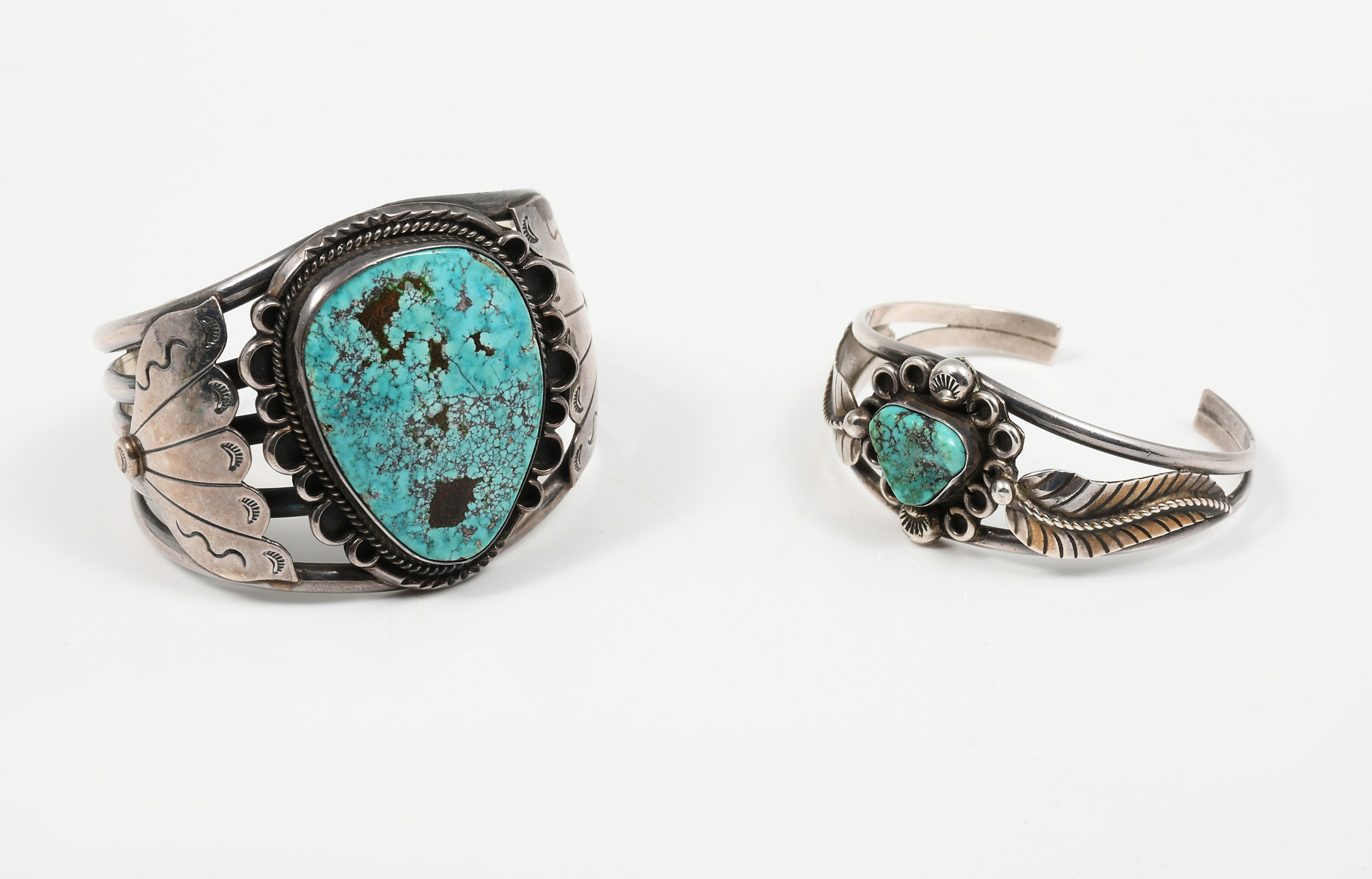 Appraisal: NATIVE AMERICAN STERLING TURQUOISE BRACELETS Sterling cuff bracelet features a