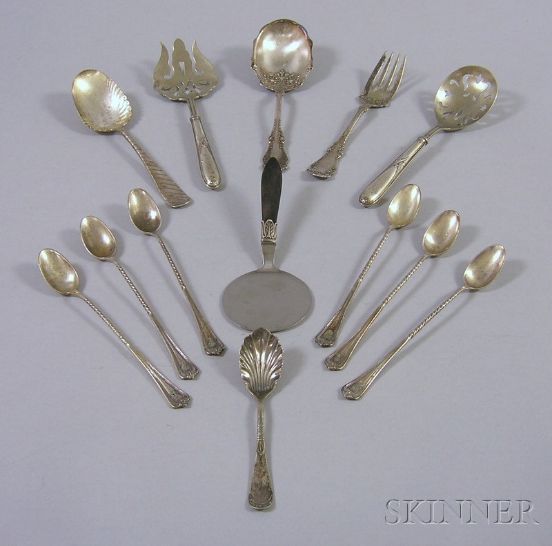 Appraisal: Thirteen Pieces of Sterling and Silver Plated Flatware a silver-handled