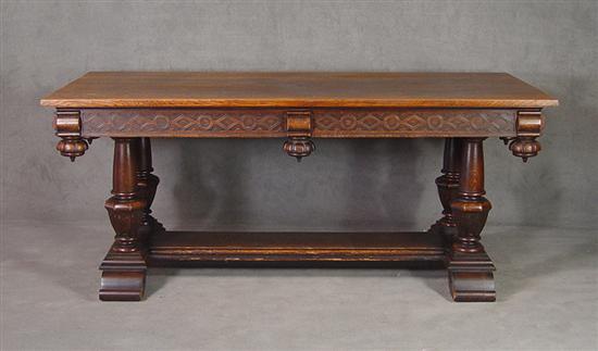 Appraisal: Oak Library Table Circa Fretwork carved apron with turned and