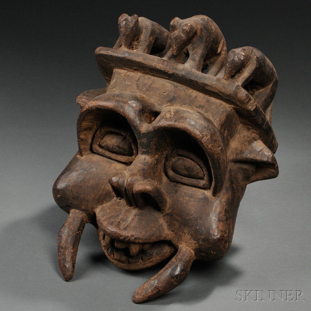 Appraisal: Cameroon-style Carved Wood Mask the flat top with three animals