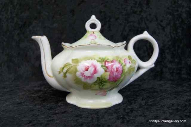 Appraisal: Lefton Handpainted Musical Tea PotCreated of Fine Bone China by