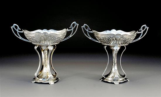 Appraisal: Pair silverplate compotes scalloped oval-form basin with scrolling handles and