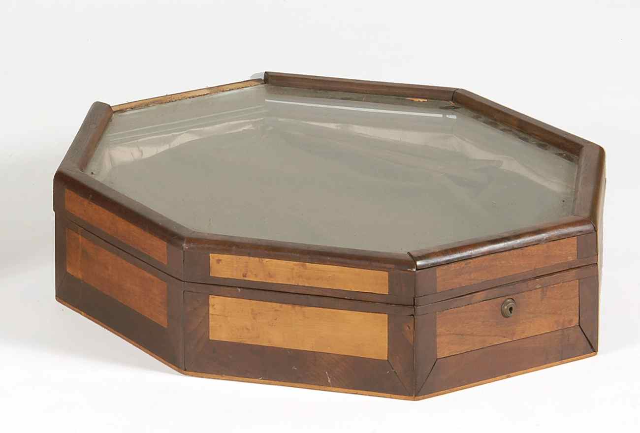 Appraisal: OCTAGONAL COUNTERTOP VITRINE In mahogany with alternating inlaid veneered panels