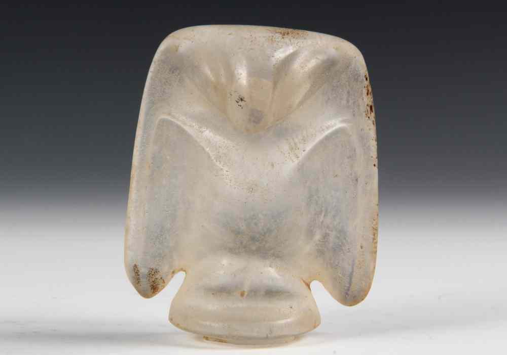 Appraisal: UNUSUAL HONGSHAN FORM ROCK CRYSTAL FALCON - One of the