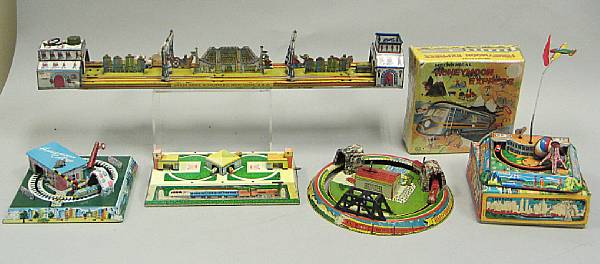 Appraisal: Tin lithographed track toys Lot features Louis Marx The Big