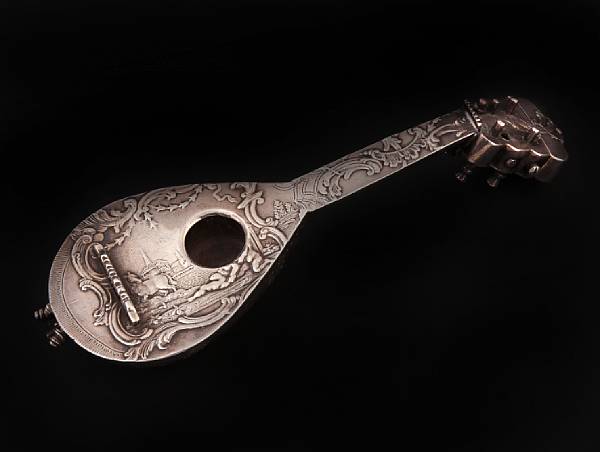 Appraisal: A Continental silver miniature mandolinApparently unmarked With losses Length in