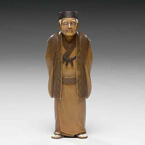 Appraisal: Japanese Carved Ivory Figure Japanese A carved and inked ivory