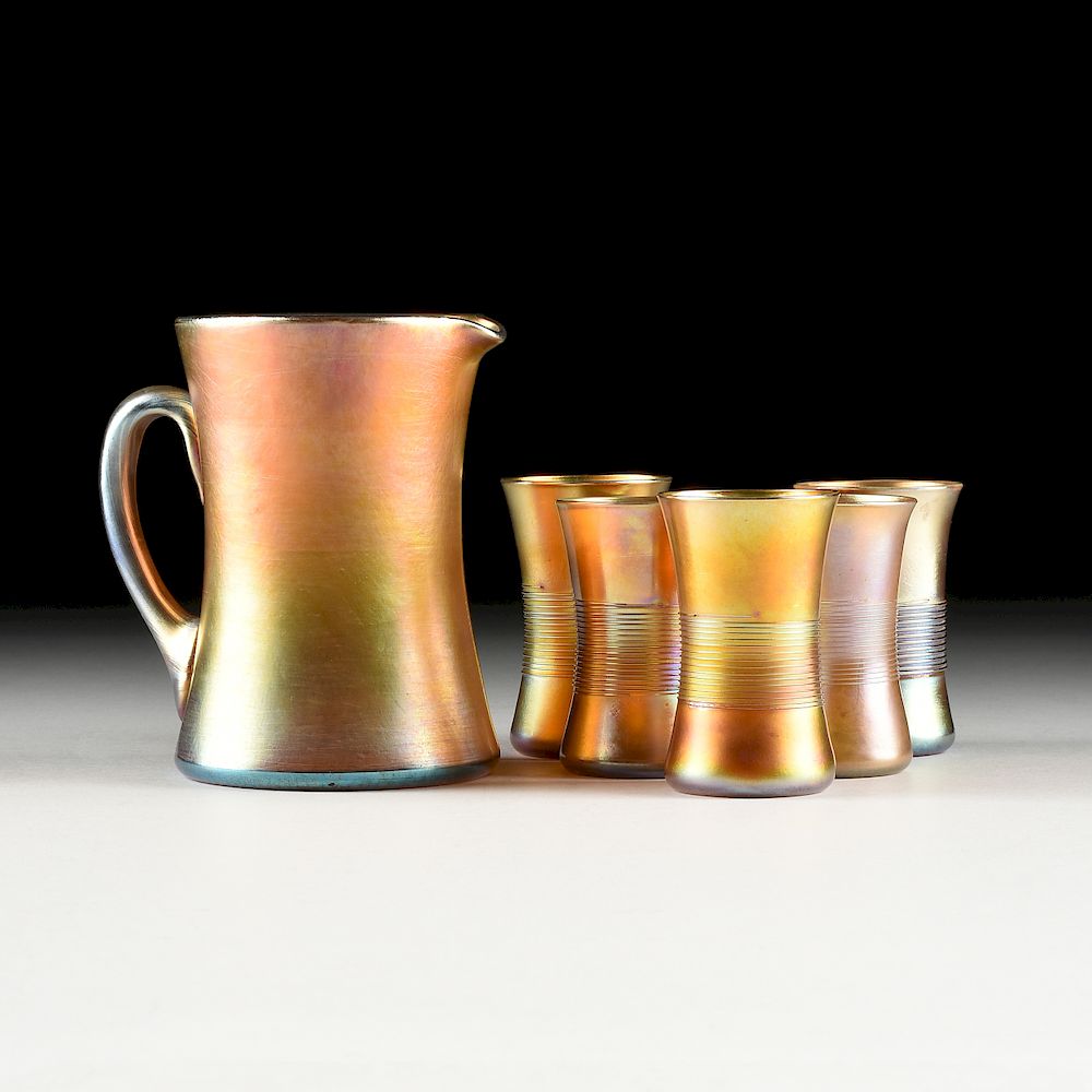 Appraisal: AN ASSEMBLED SIX PIECE LOUIS COMFORT TIFFANY FAVRILE GLASS PITCHER