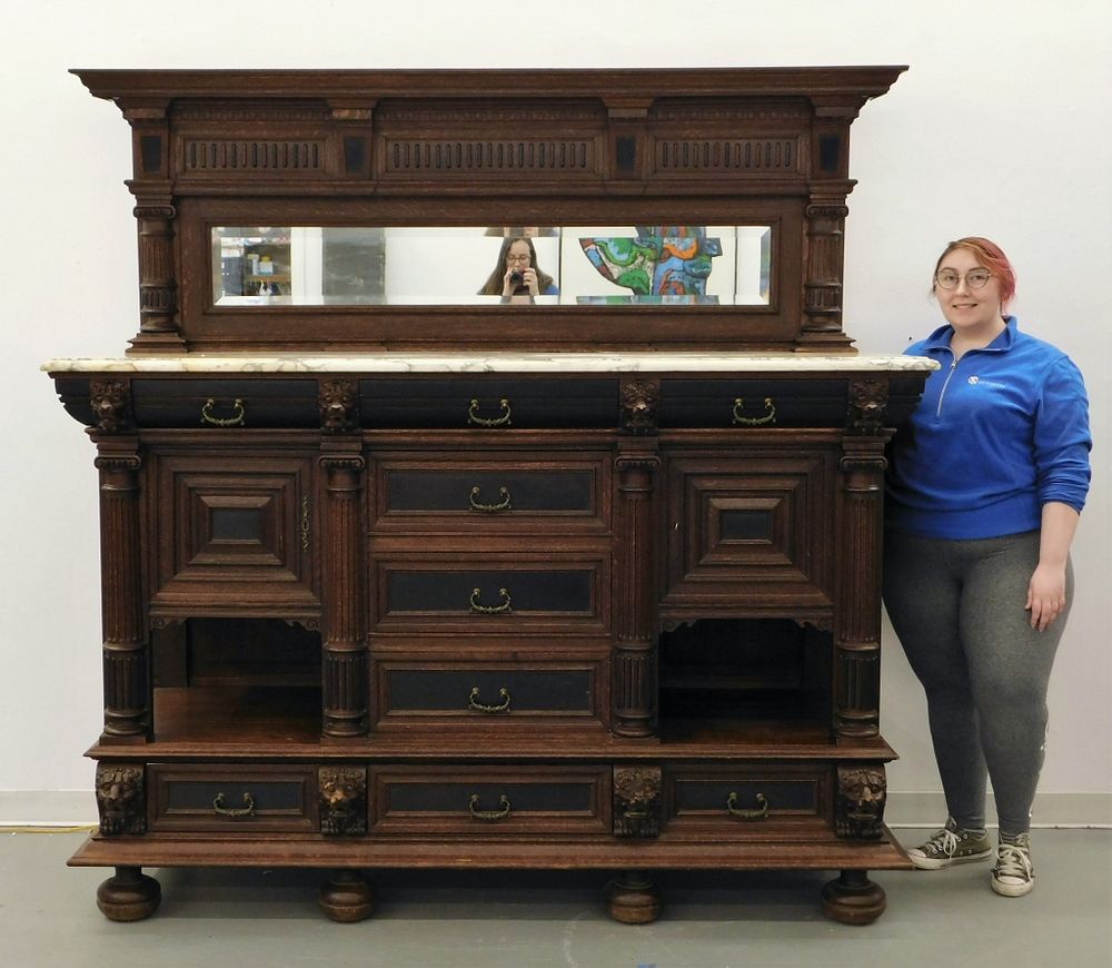 Appraisal: European Victorian Carved Oak Marble Sideboard Europe th Century Finely