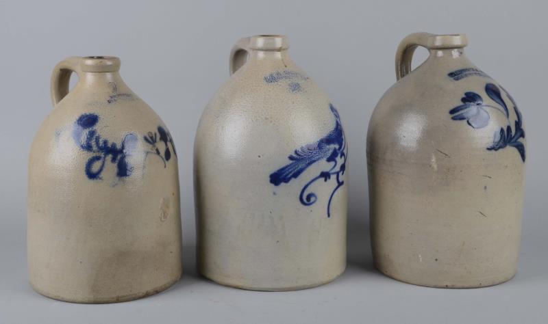 Appraisal: D Lot Of Various Two-Gallon Stoneware Jugs These three stoneware