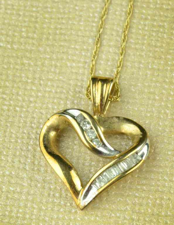 Appraisal: Ladies K Heart Necklace with DiamondsHeart-shaped K gold pendant with