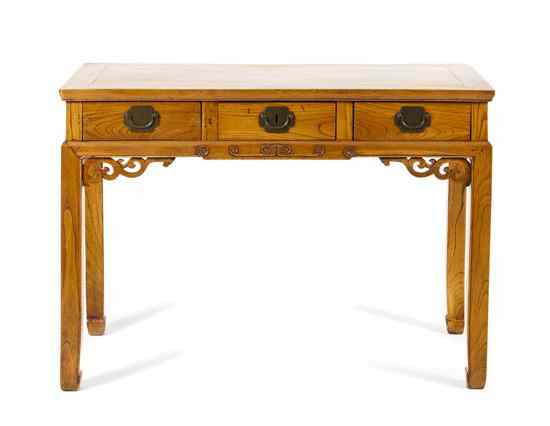 Appraisal: A Chinese Elmwood Writing Desk having a rectangular top above