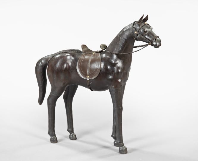 Appraisal: Large English Black Leather Figure of a Horse the alert