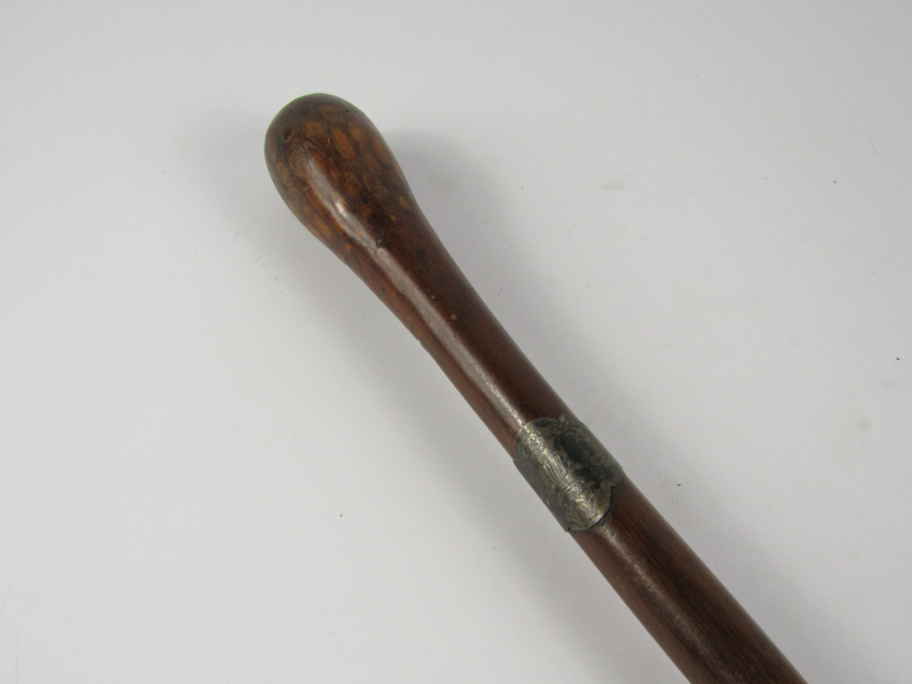 Appraisal: A Victorian root wood walking stick with a monogrammed plated