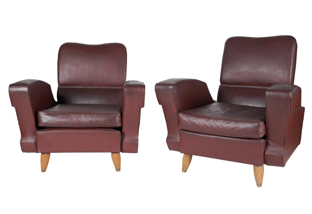 Appraisal: PAIR OF ITALIAN BURGUNDY LEATHER ARMCHAIRSunsigned sculptural design with fluted