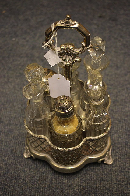 Appraisal: A VICTORIAN SILVER CRUET STAND marks for Sheffield cm high