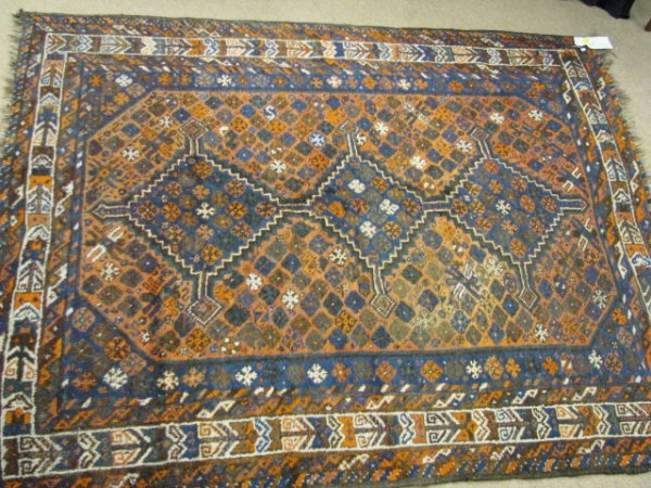 Appraisal: Wool oriental hand woven rug with orange blue cream and