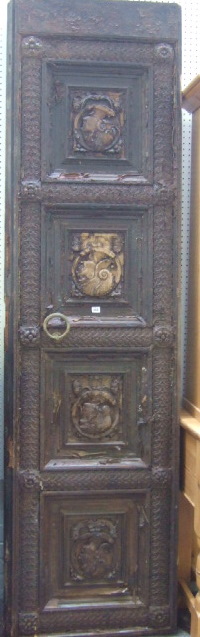 Appraisal: A pair of large hardwood external doors each carved with