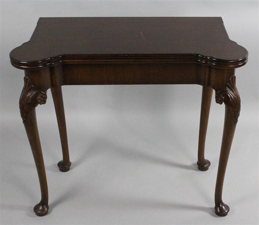 Appraisal: QUEEN ANNE STYLE MAHOGANY CARD TABLE with a hinged rectangular