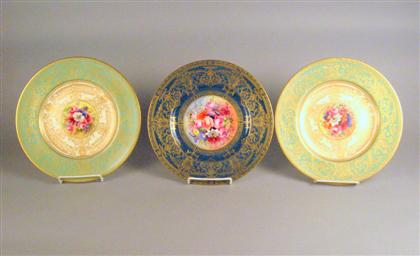 Appraisal: Three Royal Worcester floral painted and gilt decorated service plates