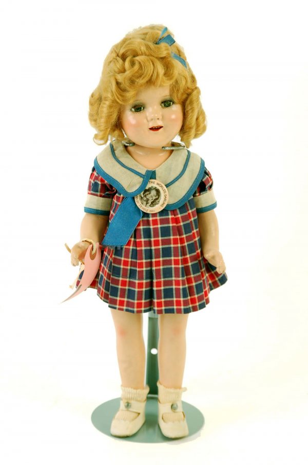 Appraisal: Shirley Temple composition doll Jointed arms and legs Sleep eyes