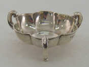 Appraisal: An Edwardian silver hexafoil bon bon dish on three bifurcated