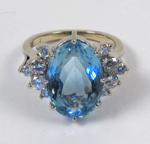 Appraisal: AQUAMARINE AND DIAMOND RING k white gold and centering an