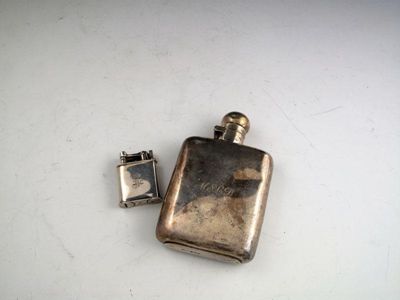 Appraisal: A silver hip flask by J Dixon and Son Sheffield