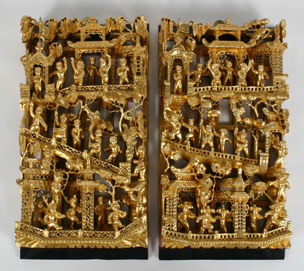 Appraisal: Carved Chinese wooden wall plaques large array of gilt figures