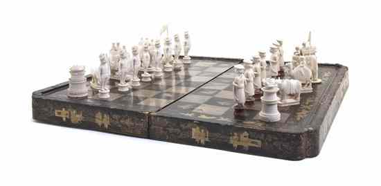 Appraisal: A Partial Anglo-Indian Ivory Chess Set comprising pieces together with