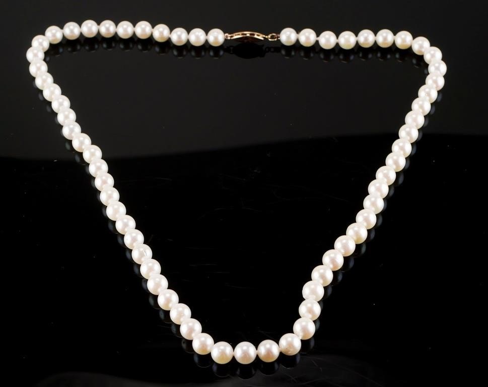 Appraisal: inch long pearl necklace pearls mm in diameter K marked