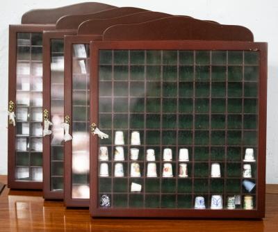 Appraisal: Four thimble display cabinets each for one hundred thimbles twenty-four