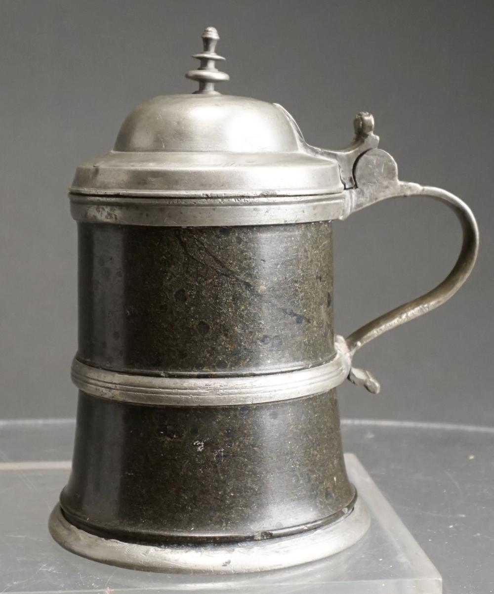 Appraisal: Continental Pewter Mounted Turned Serpentine Stein as is H in