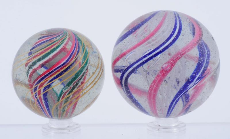 Appraisal: Lot Of Large Swirl Marbles The smaller is a multicolor