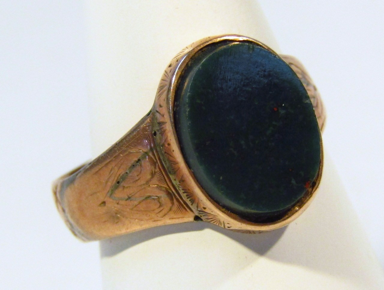 Appraisal: A gentleman's ct gold ring oval set with a green