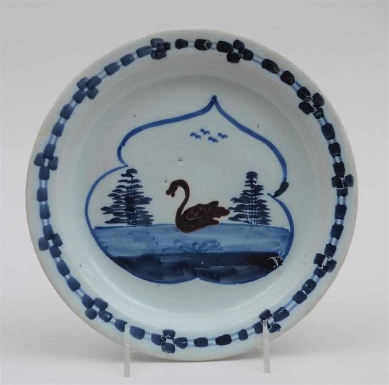 Appraisal: LONDON DELFT POLYCHROME PLATE Circa centered by two dark blue