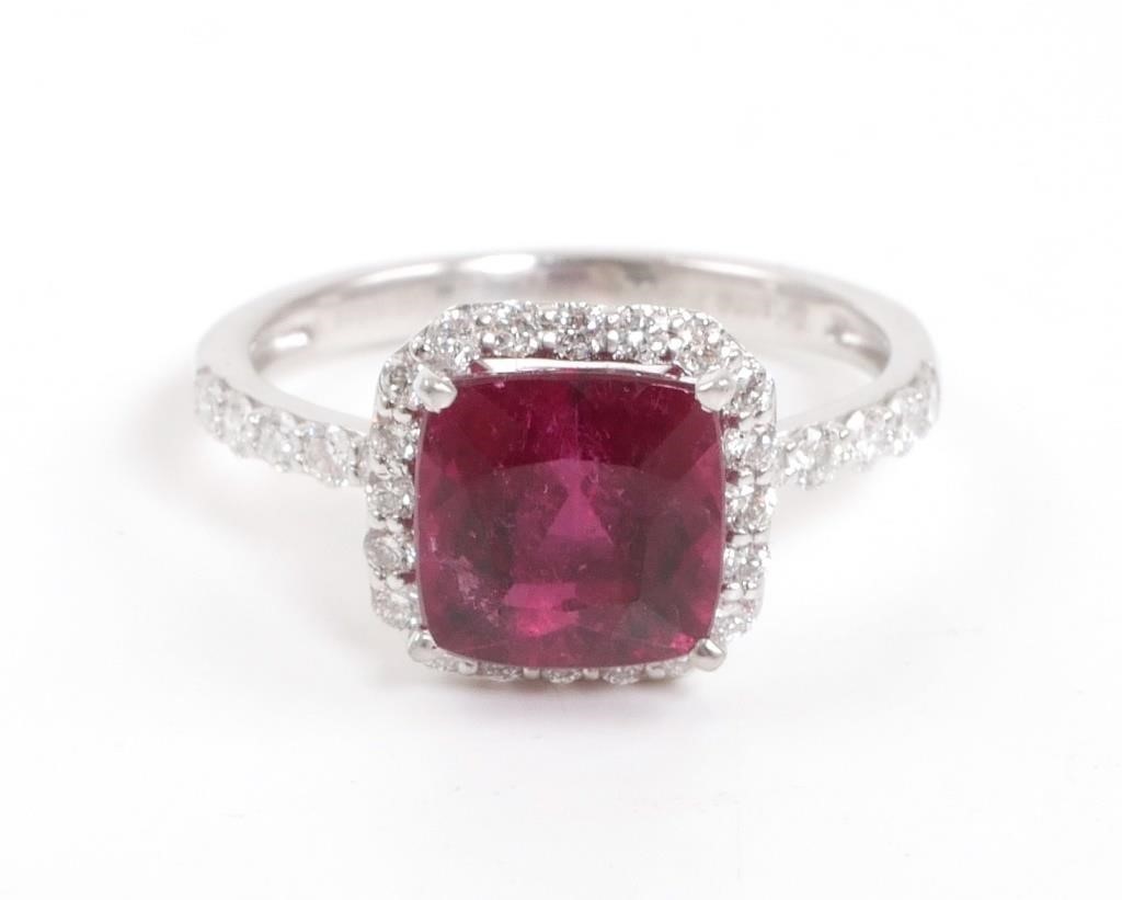 Appraisal: PLATINUM RUBELLITE TOURMALINE DIAMOND RINGOne polished stamped and tested platinum