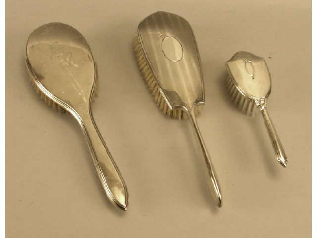 Appraisal: Collection of sterling silver hair brushes including a babies brush